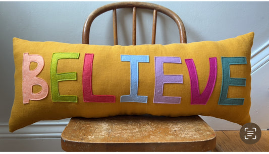 BELIEVE Christmas Pillow in Mustard Yellow Linen and Jewel Tone Letters